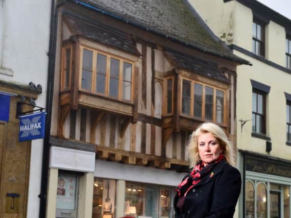Dawn Branigan pictured outside First Light Photographic on Daventry High Street