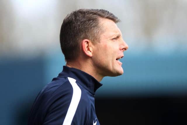 FIRST WIN: Dean Austin claimed his first win in charge of the Cobblers at Bury on Saturday. Picture by Sharon Lucey