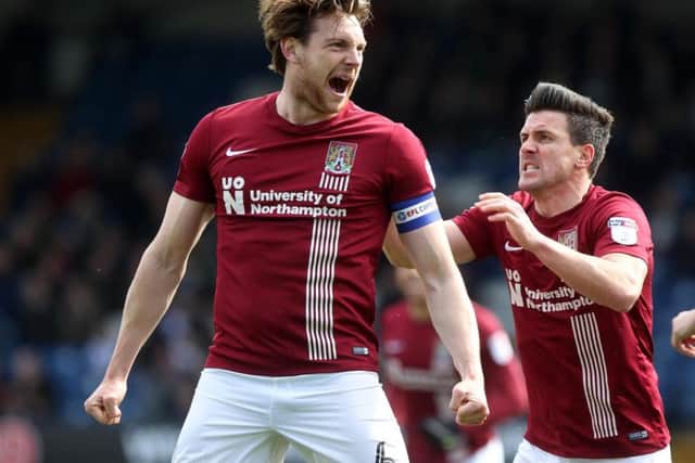 Captain's goal: Skipper Ash Taylor celebrates