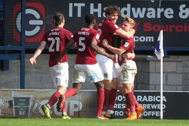 ASH TO THE RESCUE: Captain Ash Taylor scored the late winning goal against Bury, reviving Northampton's survival hopes this season. Pictures: Sharon Lucey