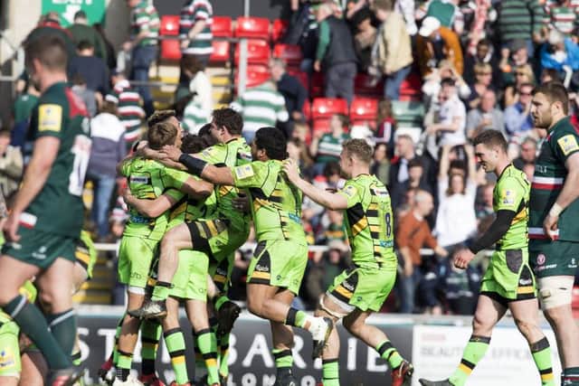 THAT WINNING FEELING! - the Saints players celebrate at the final whistle (Pictures: Kirsty Edmonds)
