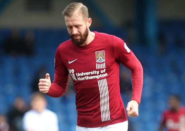 Kevin van Veen leaves the Gigg Lane pitch on Saturday having suffered a dead leg injury