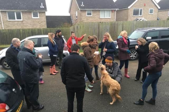 Just a handful of the people who helped search for Bertie celebrate his safe return.