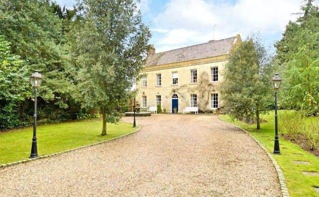 A Grade II listed 17th century six/eight bedroom detached Georgian rectory on the market for £1,575,000.