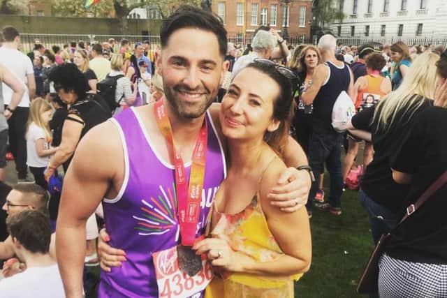 Paul and proud wife, Kim pictured at the London Marathon yesterday after receiving his medal.