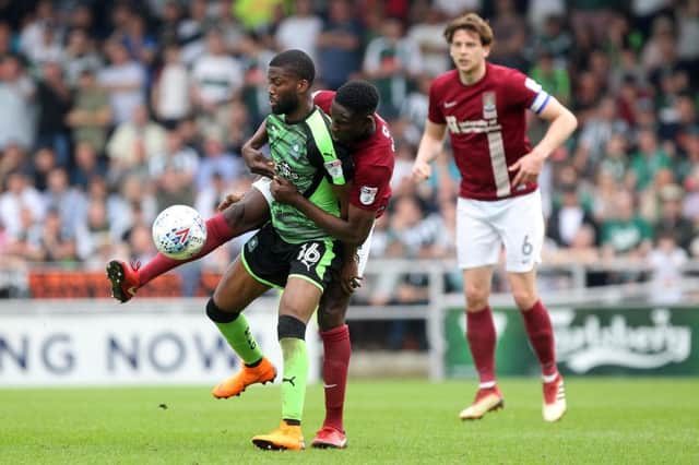 BLOCKED: Centre-backs Leon Barnett and Ash Taylor led Cobblers to a clean sheet on Saturday, just their sixth in the league this season. Pictures: Sharon Lucey
