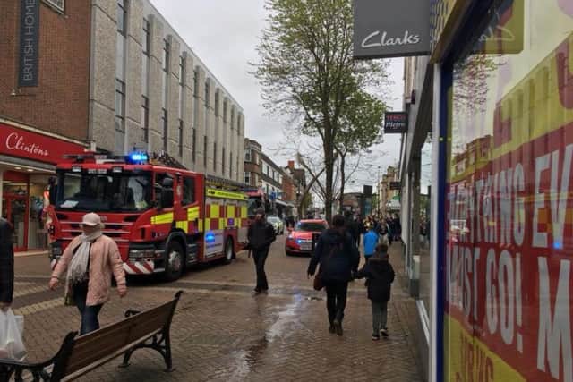 Three fire engines were called to Abington Street following reports of a burning smell coming from the empty BHS store.