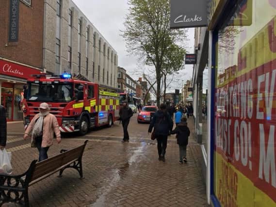 Three fire engines were called to Abington Street following reports of a burning smell coming from the empty BHS store.