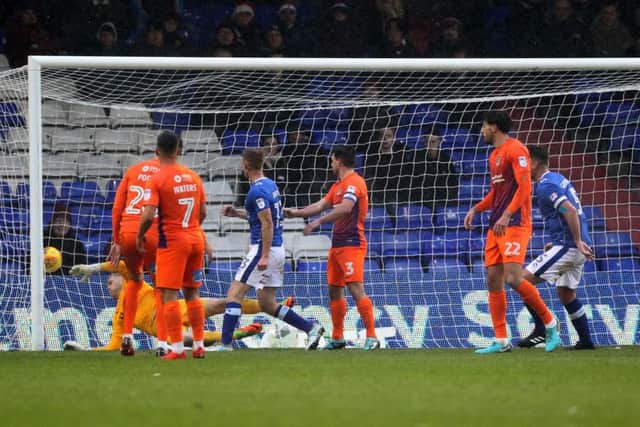 A snowy Boundary Park saw Oldham run riot in the reverse fixture