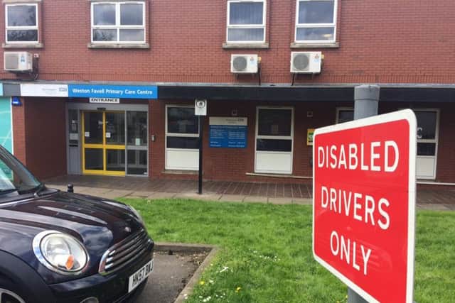 Only two disabled spaces have been left for all 30,000 patients at Weston Favell Health Centre.