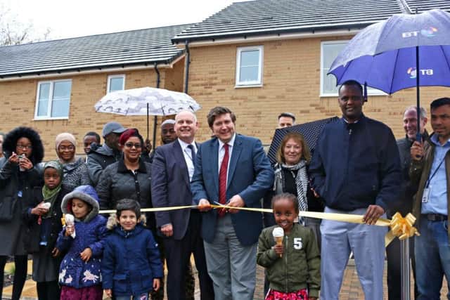 Families gathered together to see their homes officially opened by NBC councillors and Andrew Lewer MP.