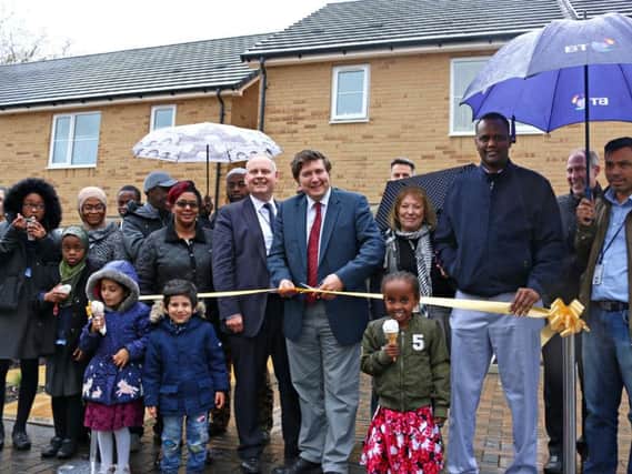 Families gathered together to see their homes officially opened by NBC councillors and Andrew Lewer MP.