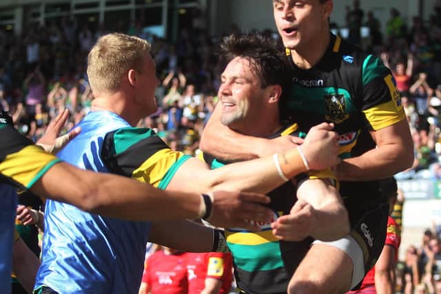 Ben Foden was mobbed by his team-mates after scoring on his final Saints appearance