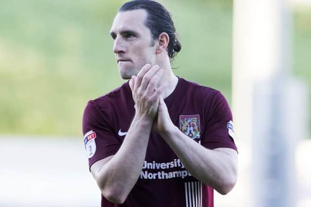 John-Joe O'Toole applauds the Sixfields supporters after last Saturday's 2-2 draw with Oldham NNL-180605-094423009
