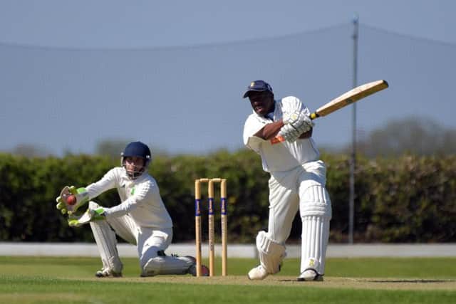 SWING AND A MISS - action from Overstone Park's draw with Burton Latimer (Pictures: Dave Ikin)