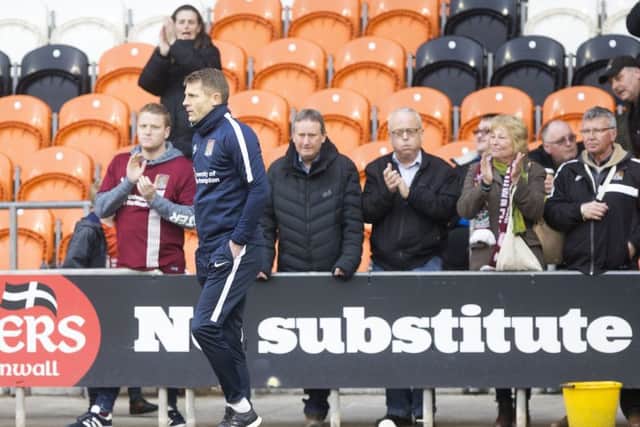 Dean Austin has made a good connection with the Cobblers supporters