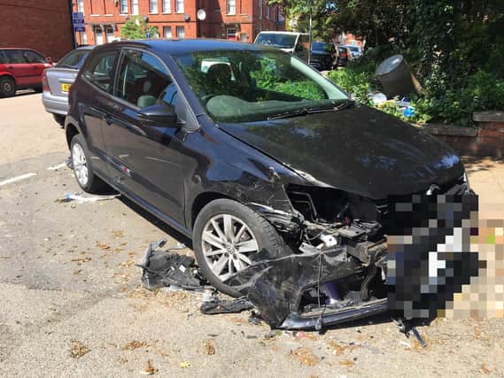 A car in Northampton was hit by a bin lorry this morning.