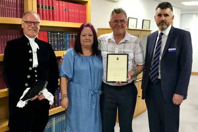 Pictured L-R at Northampton Crown Court: The high sheriff, Ian Fox and his wife Caroline, and superintendent Mark Behan, representing the chief constable.