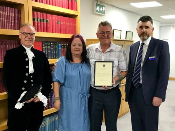 Pictured L-R at Northampton Crown Court: The high sheriff, Ian Fox and his wife Caroline, and superintendent Mark Behan, representing the chief constable.
