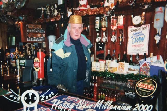 Dave behind the bar for The Millenium at the Compass Inn.