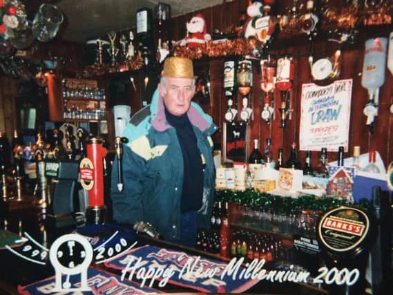 Dave behind the bar for The Millenium at the Compass Inn.