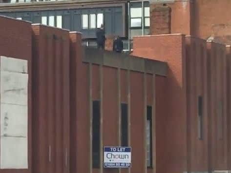 The boys enter the rooftop via an access stairwell above Cash Converters.