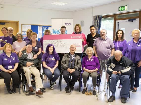 Representatives from Access Legal, who take it in turns to volunteer for Brewin's Stroke Group every month, handed over a 1,000 cheque to the charity on Friday (May 25).