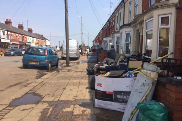 Residents have been forced to throw out items damaged by the murky waters.