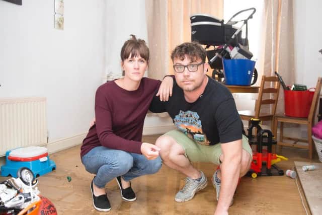 Richard Short and his partner watched as four inches of brown floodwater swept through their home.