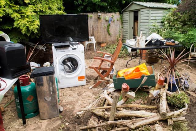The family is throwing out their lounge TV and washing machine.