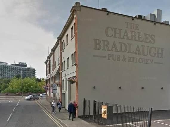 A woman claims she was kidnapped from outside the Charles Bradlaugh pub and raped.