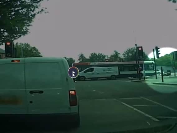 The shocking moment the man is a hit by a bus as he steps into the road on Black Lion Hill