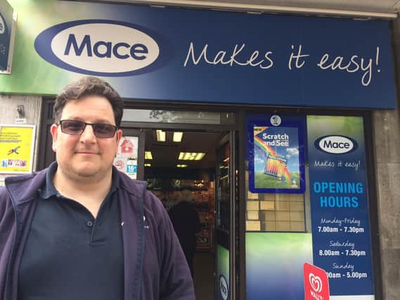 Andrew runs the Mace newsagents in Northampton market square.