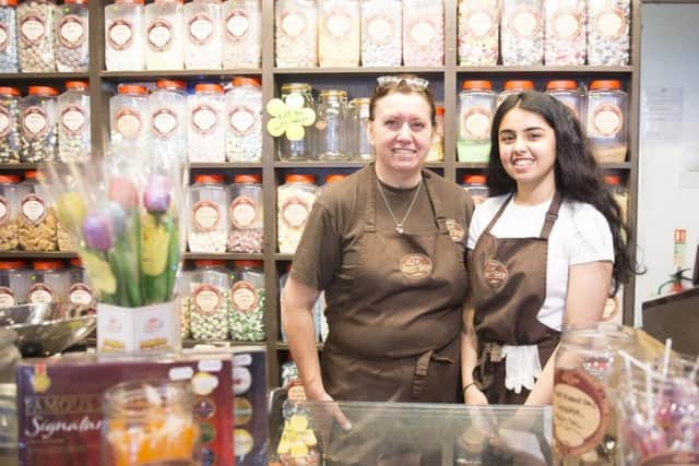 Pictured from left-right: shop manager of six years, Wendy McCausland and shop assistant Alisha Rehmatullah at Browne's Olde Sweet Shop in the Grosvenor Centre. The firm can even supply sweets to weddings.