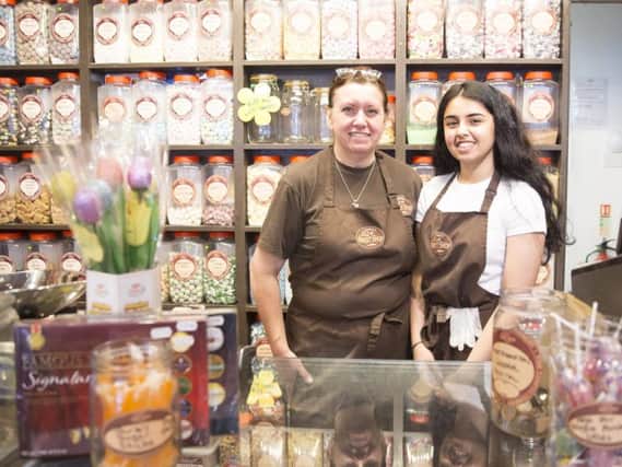 Pictured from left-right: shop manager of six years, Wendy McCausland and shop assistant Alisha Rehmatullah at Browne's Olde Sweet Shop in the Grosvenor Centre. The firm can even supply sweets to weddings.