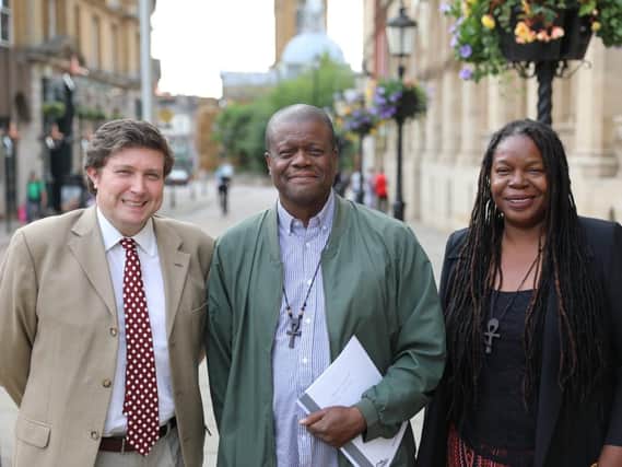 Andrew Lewer, Joe Robinson and Nadine Robinson outside the Guildhall this week. Windrush migrant Joe is back on the emergency housing list thanks to a Chron appeal.