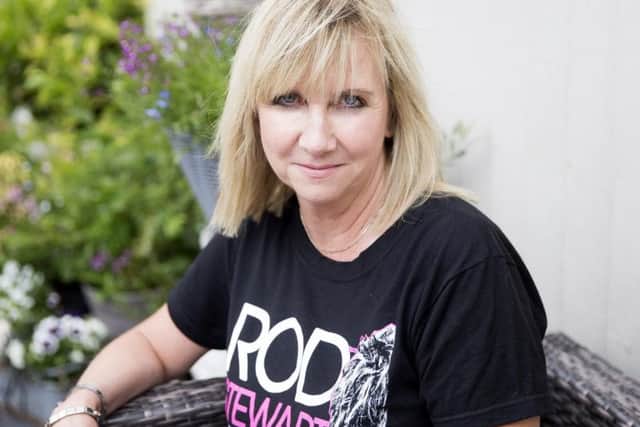 Kim Russell pictured in her Rod Stewart t-shirt, which she bought for $45 before she was refused from concert.