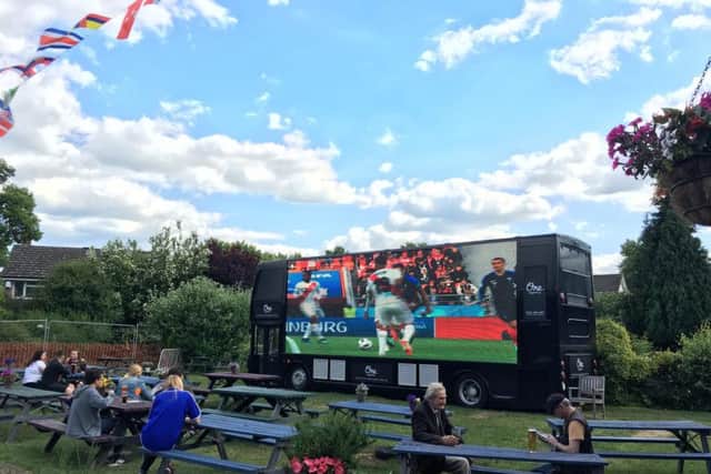 The Spinney Hill pub has hired out a gigantic TV screen