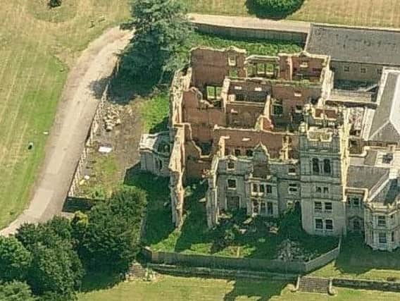 Overstone Hall was gutted by fire in 2001. Now, a plan to build 60 houses near to the site is the subject of a campaign by Overstone residents.