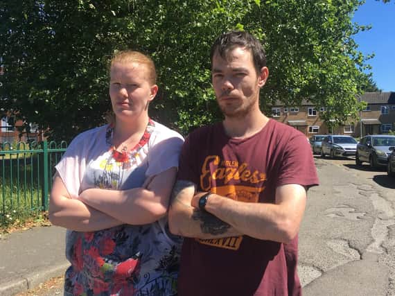 Exter Place residents Krisztian Piko and Rebecca Trusler have issued an urgent plea to the powers that be to give their street a much-needed facelift.