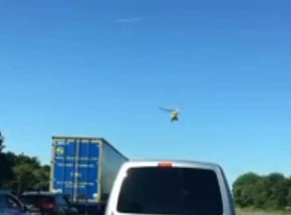 The Warwickshire and Northamptonshire air ambulance service landed on the A43 yesterday.
