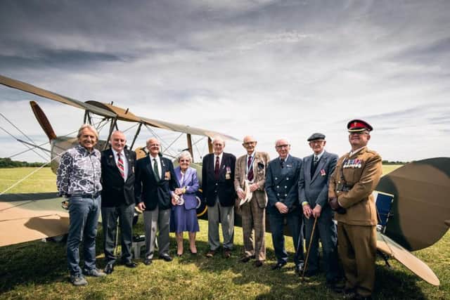 Pictured L-R: Le Mans 'legend' Derek Bell MBE, vice chair - Gary Schiltz, WW2 Veterans - Dennis Wells, Joan Wells, Maurice Marriott, Martin Calvert, Eddie Habberley, Ted Barker and chaperone Major Philip Linehan VR REME, the Second in Command of 103 Battalion REME'. Copyright: Malcolm Griffiths.