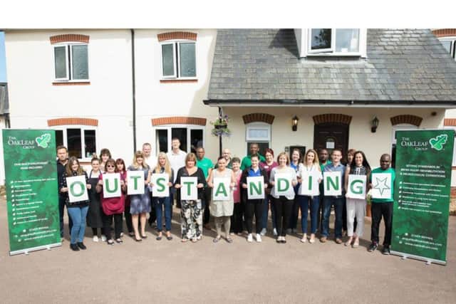 The Oakleaf Group staff celebrate