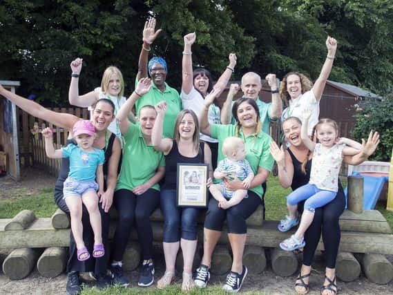 The staff and children at Acorn Childcare UK are all smiles after claiming first place in our Nursery school of the Year competition.