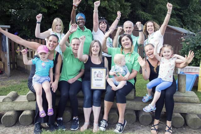 The staff and children at Acorn Childcare UK are all smiles after claiming first place in our Nursery school of the Year competition.