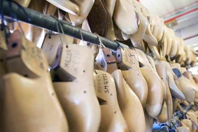 1,000 pairs of shoes are made in the factory weekly by 96 Trickers employees.