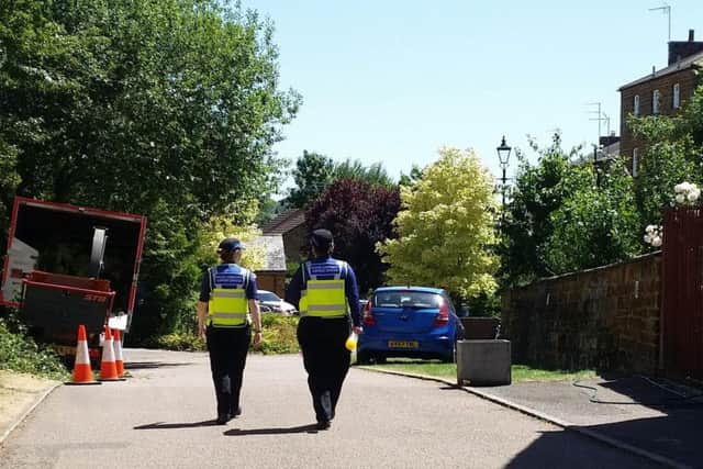 Police at the scene near Gilbert Scott court in Towcester where there is understood to have been a serious incident.