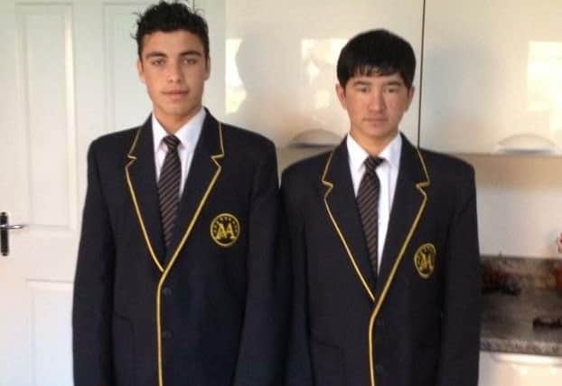 Afridi and Aziz in their school uniforms shortly after they moved in Paul and Jane, aged 13 and 14.