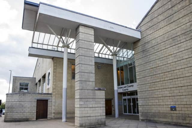 Nicholas Dunne was jailed at Northampton Crown Court for threatening Northampton security staff with knives while shoplifting.