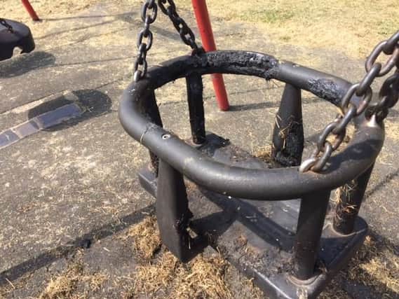 The swing seat in Kingsthorpe rec has been left burnt and partially melted.
